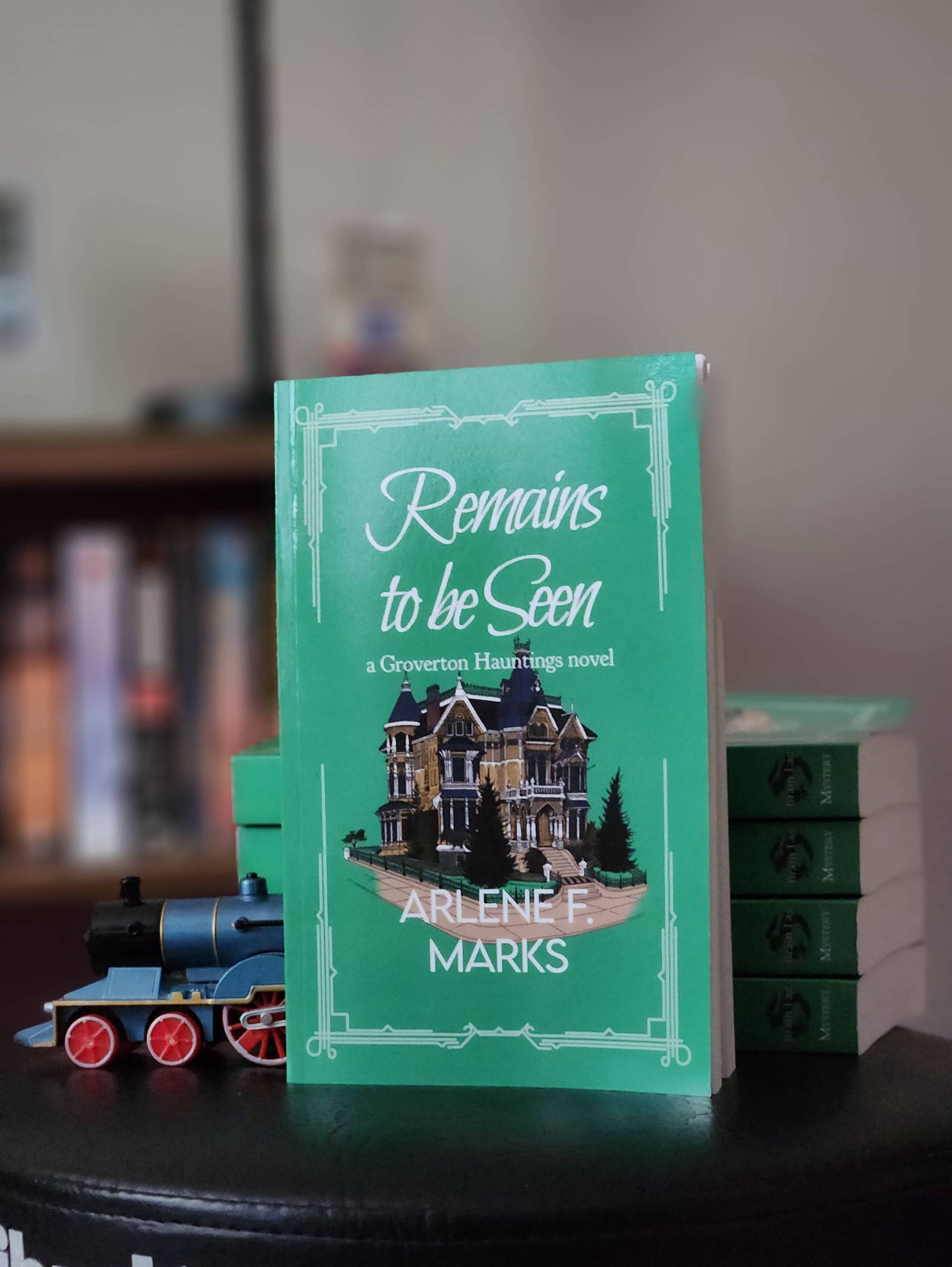 Photo of book on stand with toy train